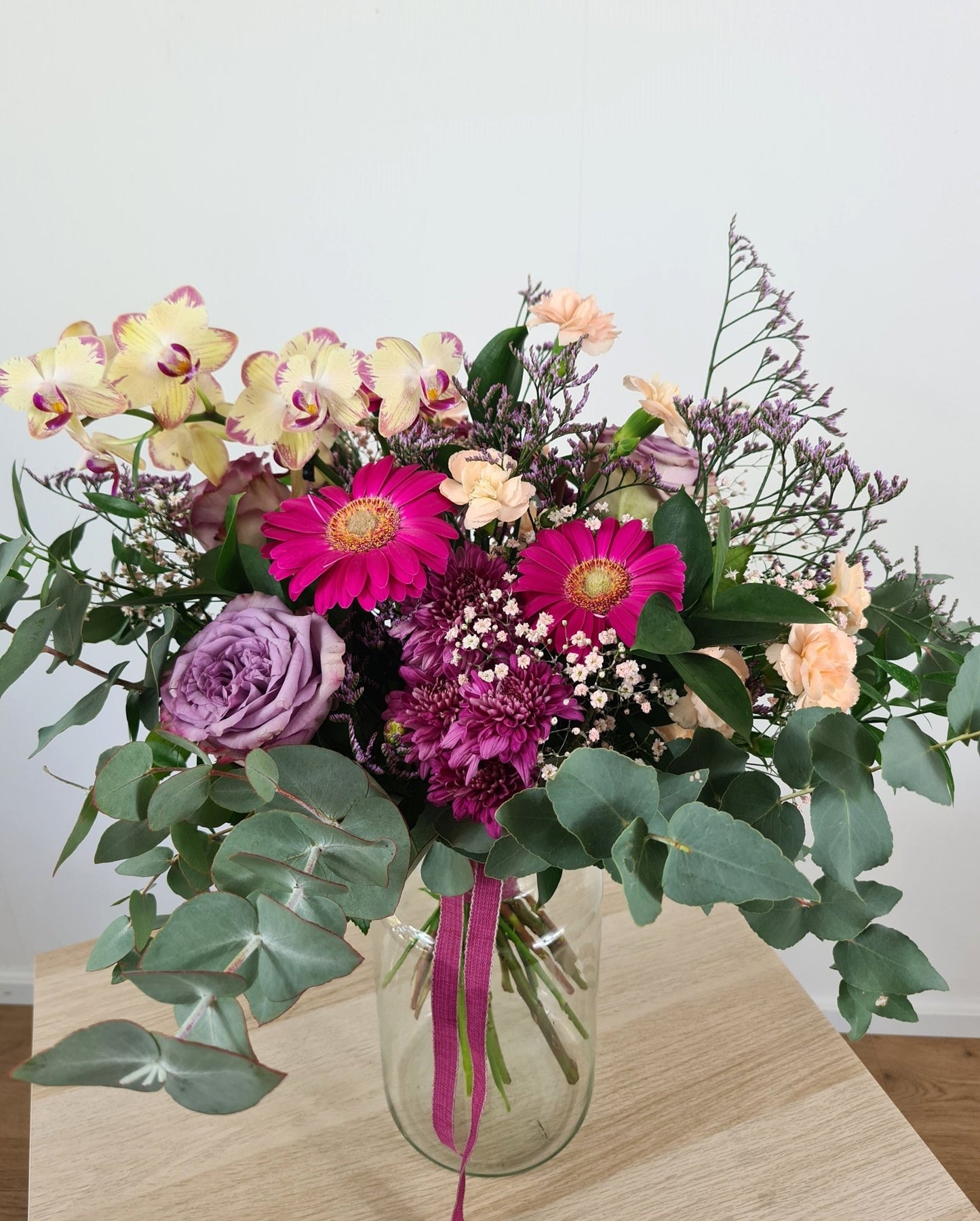 Bouquet avec branches d'orchidée - Osiris Fleurs